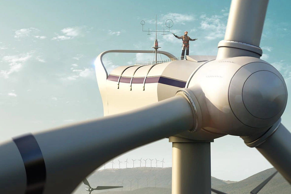 Happy engineer feel success after good work. He standing a top of windmill and looking beautiful sunset landscape