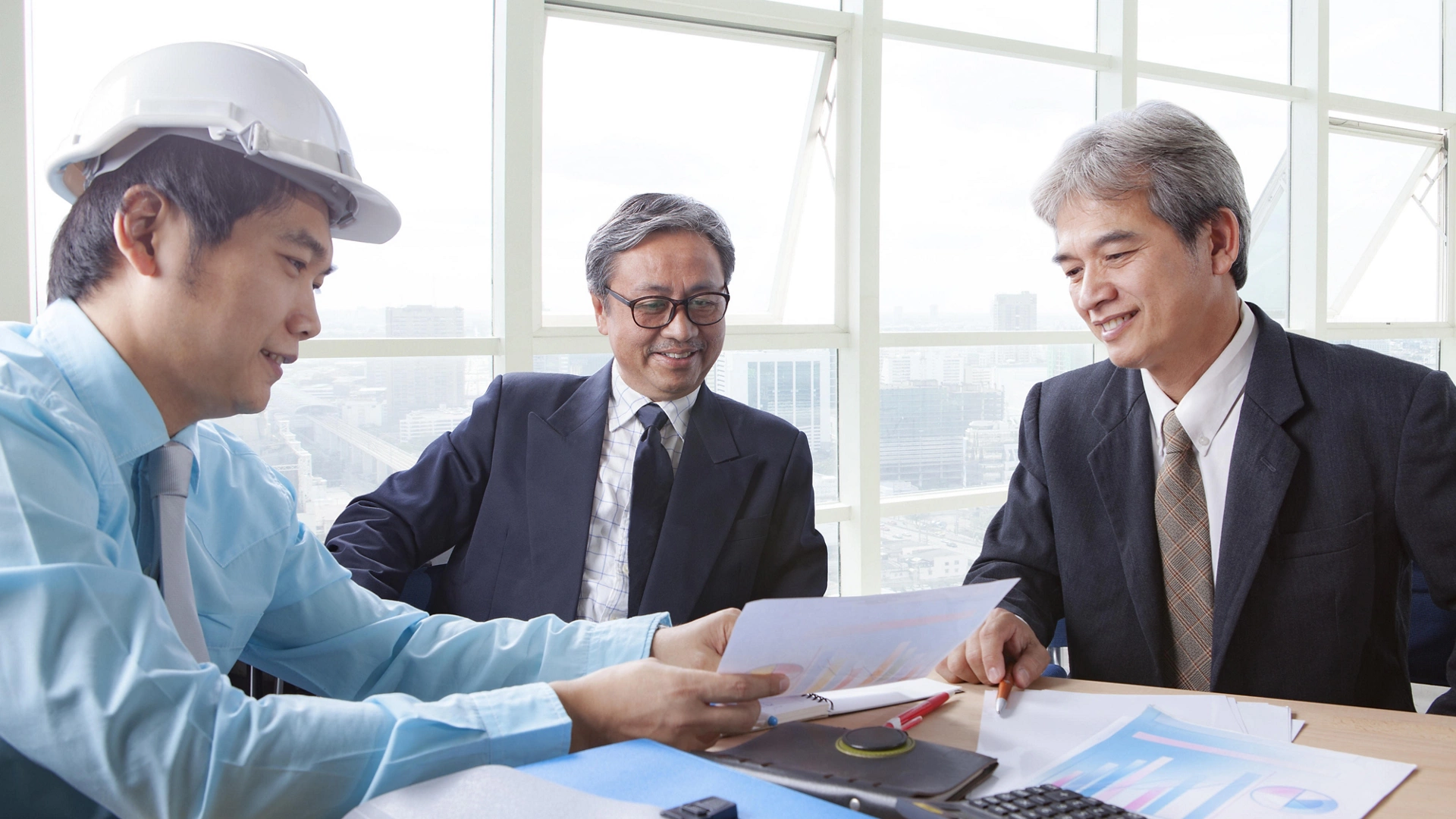 team of young and senior engineering man project meeting in working office for project discussion
