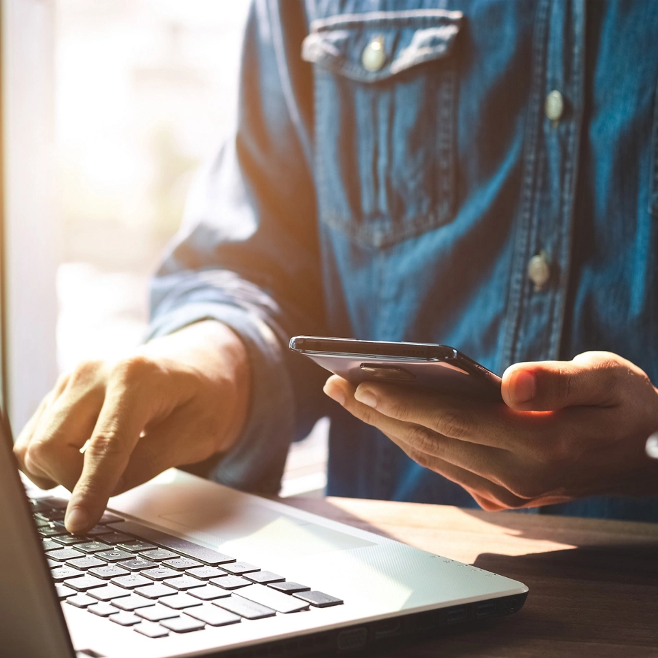 Work using mobile phone typing computer mobile chat laptop contact us at workplaces, planning ideas investors internet searching, ideas connecting people.