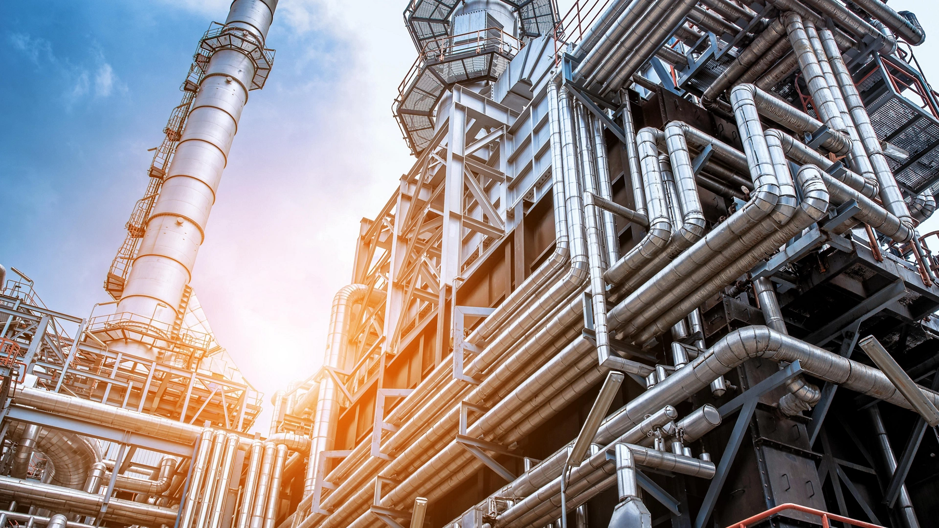 Close up Industrial view at oil refinery plant form industry zone with sunrise and cloudy sky.