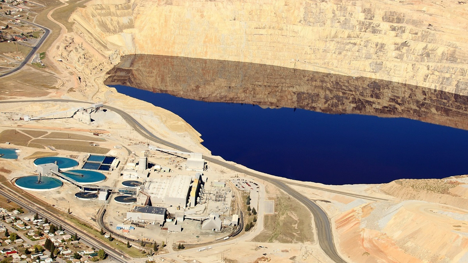 An aerial view of the evaporation pond and water treatment facilities at an open pit copper mine