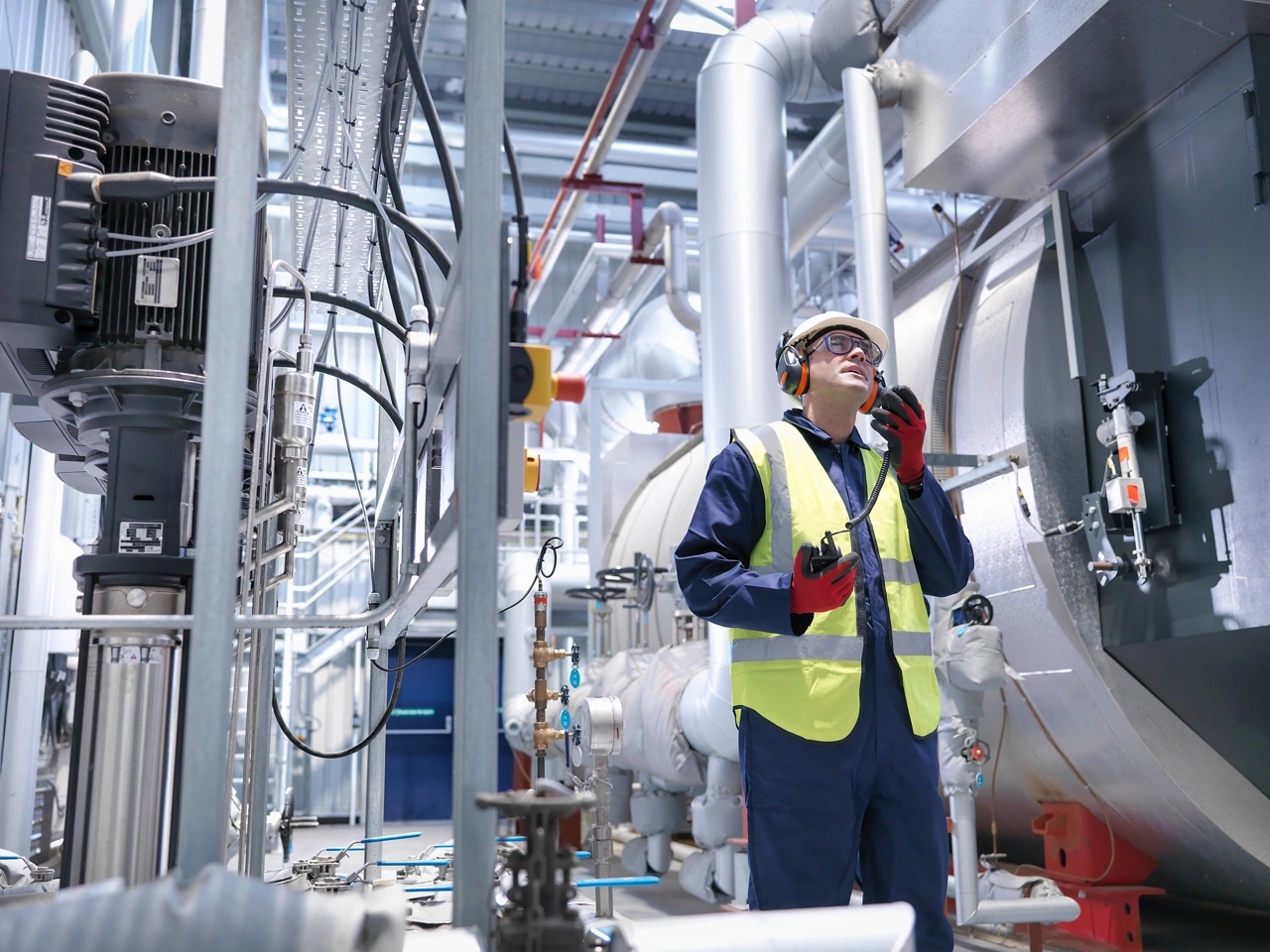 Worker using radio in gas fired power station
 
 Image downloaded by   at 7:27 on the 15/06/15