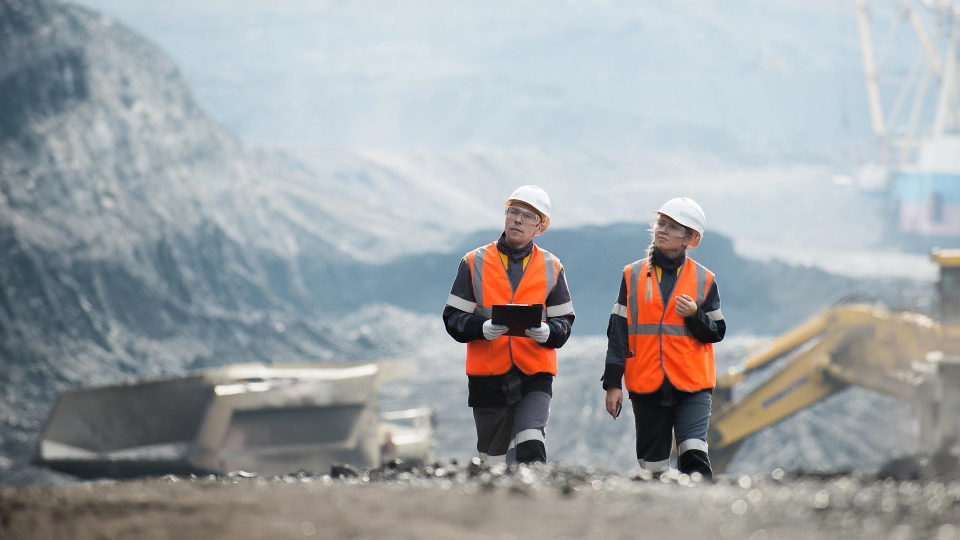 Workers with coal at open pit
