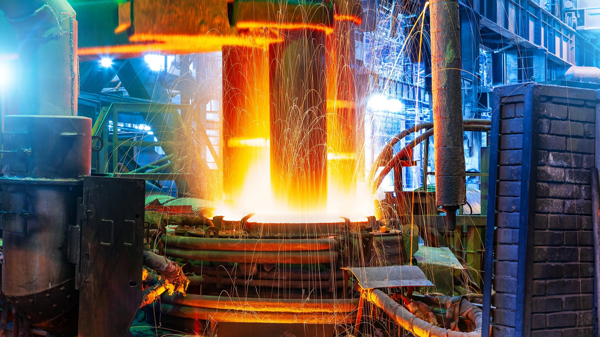 Working electroarc furnace at the metallurgical plant workshop